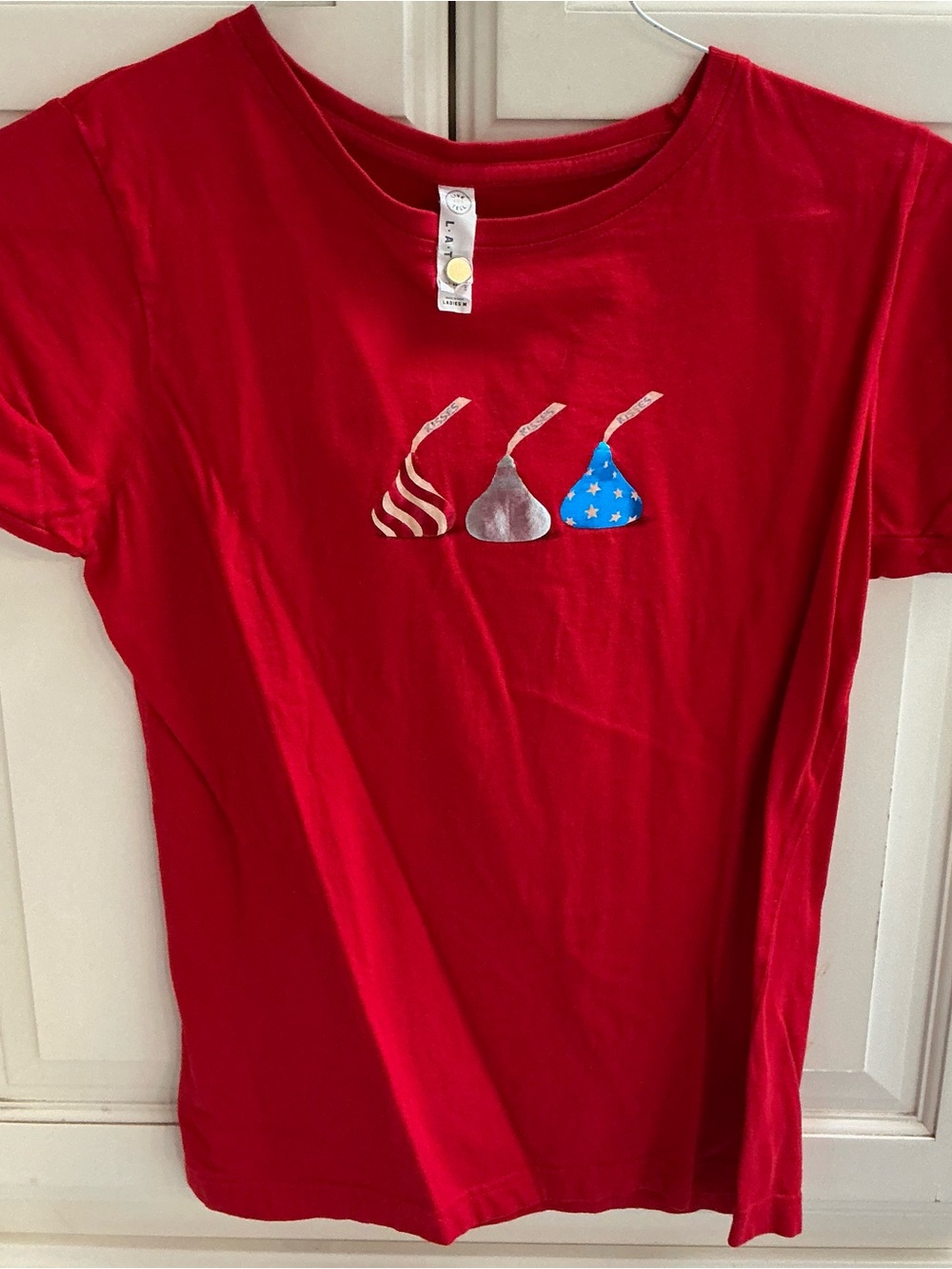 Live and Tell Ladies M Red Short-Sleeve Graphic Tee with Candy Kiss Motif